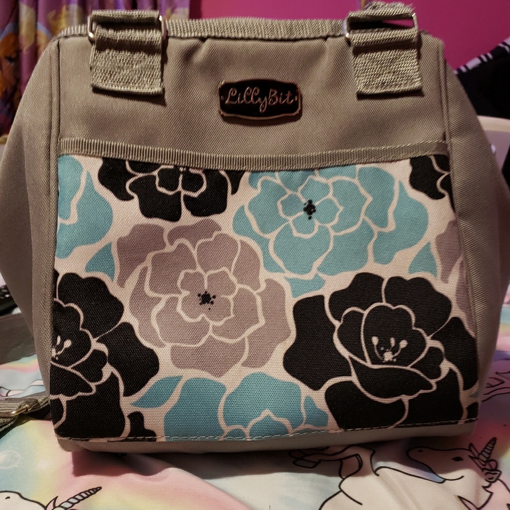 lilly Bit diaper clutch with cross over strap